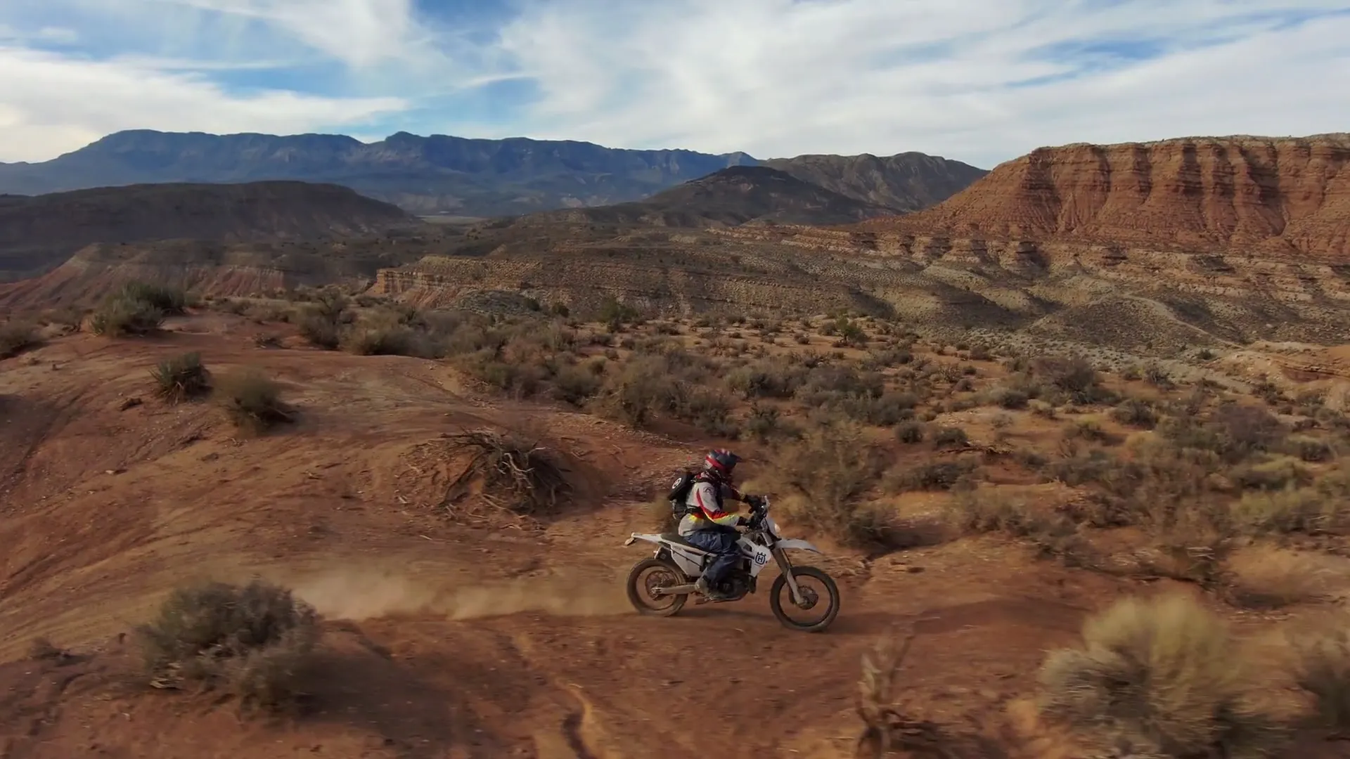Dirt bike rider on off-road canyon trail in Southern Utah