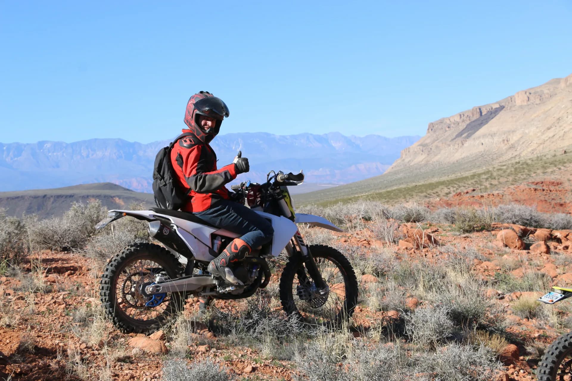 Husqvarna dirt bike on off-road desert trail in Southern Utah